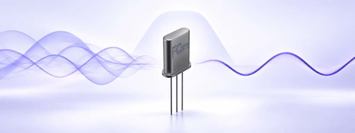 FCom three-lead crystal filter with purple signal waves illustrating frequency selection.